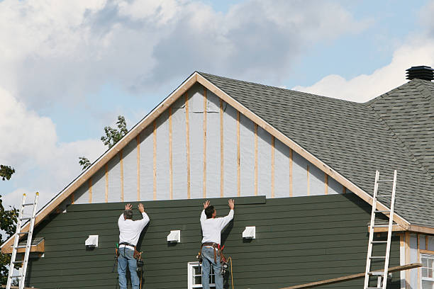 Professional Siding Installation technician working in Dacono, CO
